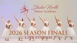 Six ballet dancers in white costumes perform on stage, raising one arm. Text above reads "Studio North Dance Academy," and below: "Studio North's Season Finale Showcase 2026 Live Stream." The background is a soft, pale gradient.