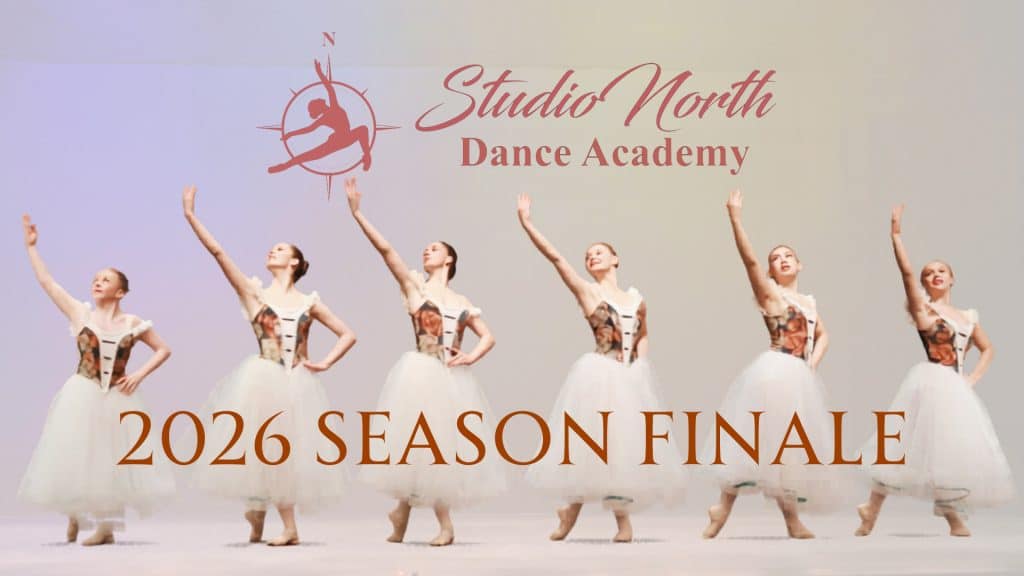 Six ballet dancers in white tutus pose on stage with arms raised. The text reads “Studio North Season Finale Showcase 2026” with a compass and dancer logo above.